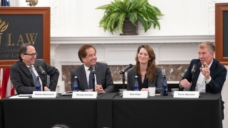 Andrew Weissmann, George Conway, Kate Shaw, and Trevor Morrison at a table