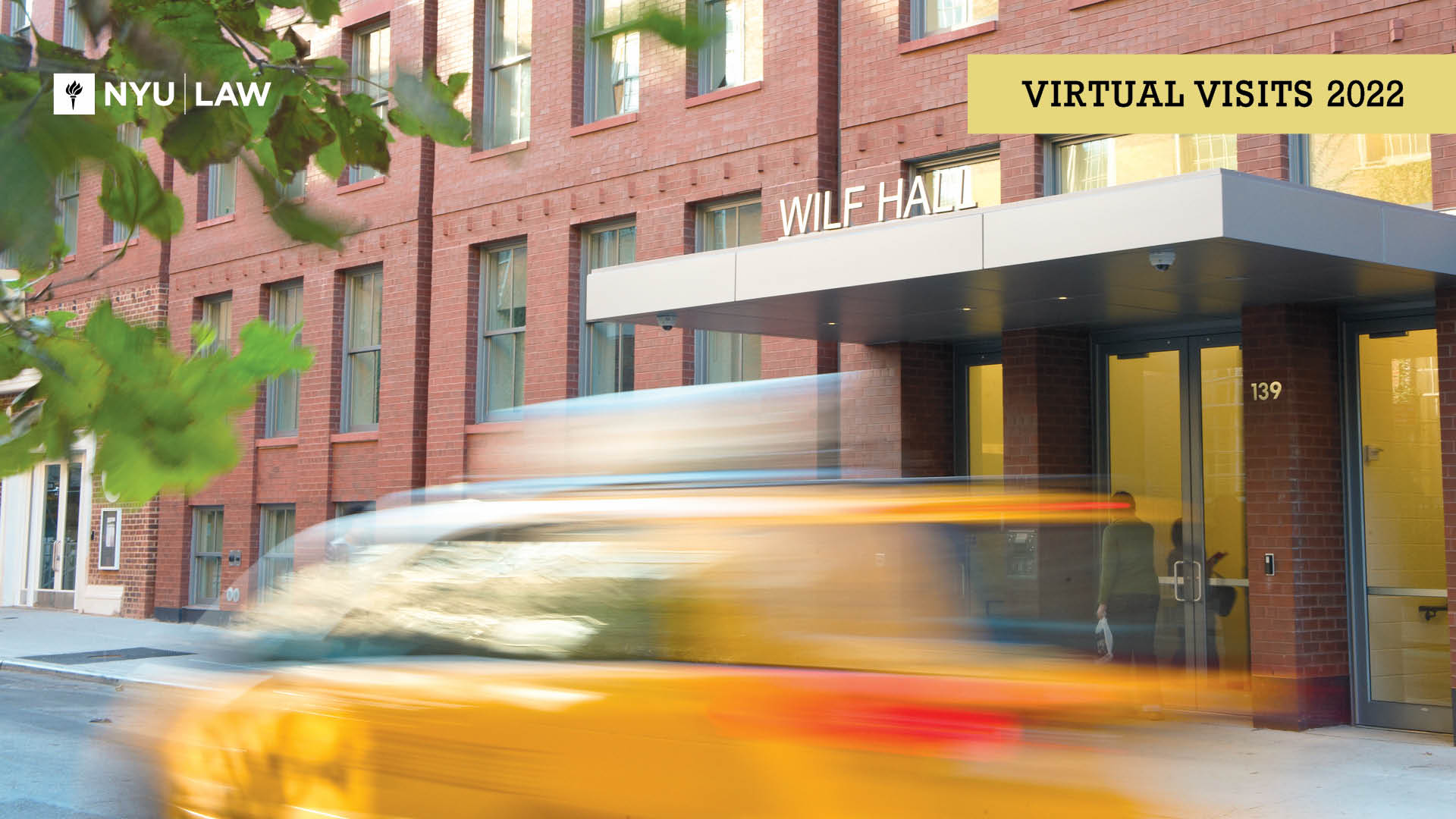 Blurred taxi in front of Wilf Hall with text "Virtual Visits 2022"