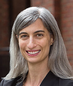 headshot of Rachel Goldbrenner, executive director of the Reiss Center on Law and Security