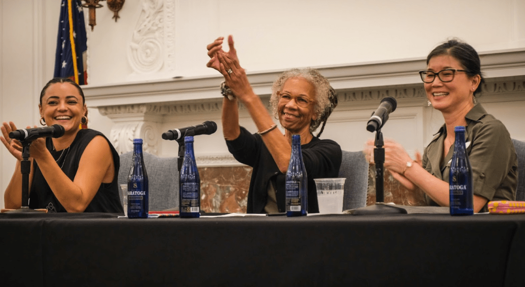 Image of Ruth Wilson Gilmore with panelists Angeles Solis and Laura Liu