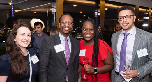 Troy McKenzie '00 and other alumni at the Rainbow Room