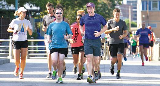 Trevor Morrison running with students