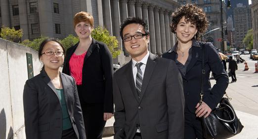 Four students in front of court